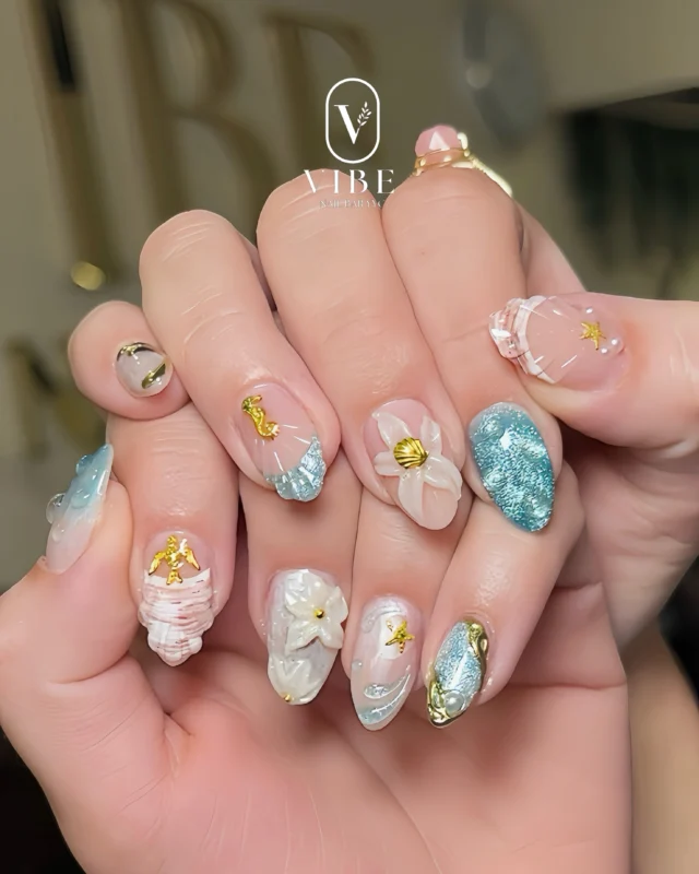 Mermaid-inspired nails for your next getaway âœ¨ðŸšðŸŒŠ
Book your appointment today . Let our expert bring your nail vision to lifeâœ¨
â€”â€”
VIBE NAIL BAR YYC
ðŸ“ 5751 Signal Hill Centre SW, Calgary, AB T3H 3P8
ðŸ“ž(403) 719-6899 
ðŸŒvibenailbaryyc.com 

#yycnails #calgarynails #vacationnails #beachnails #oceaninspirednails